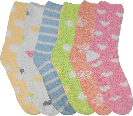 A set of six pairs of cozy fuzzy slippers socks in various colors with different patterns including stripes and floral designs.